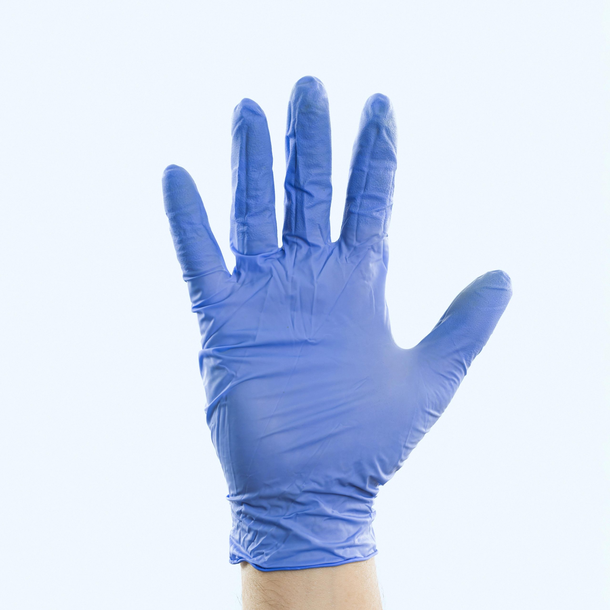 hand-with-latex-glove-showing-palm hand-with-latex-glove-showing-palm