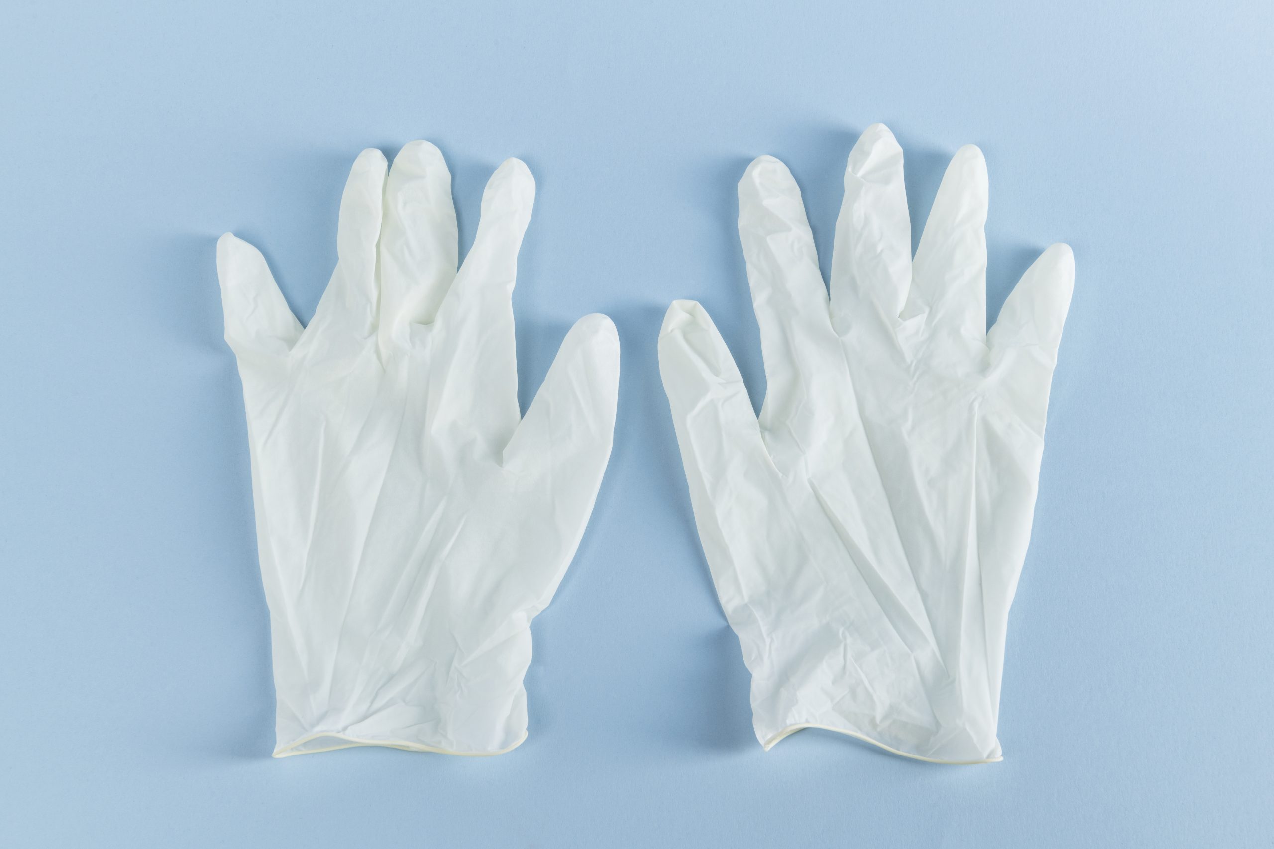 White latex gloves to prevent coronavirus contamination White latex gloves to prevent coronavirus contamination